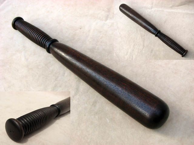 Long hardwood truncheon with grooved grip stamped 'GR'